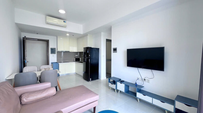 Living room and kitchen of Masteri An Phu Tower B apartment with full furnishing and pastel accents
