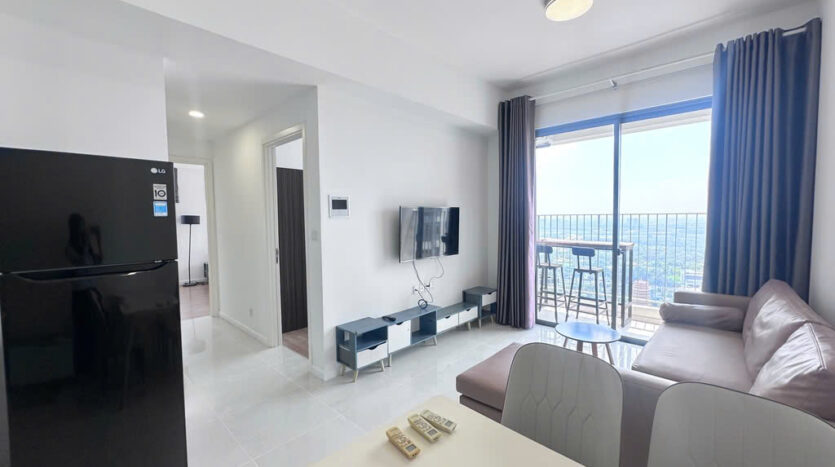 Living room with large balcony and high-rise view at Masteri An Phu Tower B apartment, full furnishing