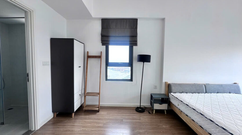Master bedroom with mattress and walk-in closet at Masteri An Phu Tower B apartment