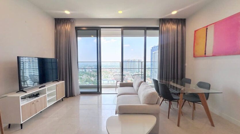 Living room overview with sofa, dining and balcony view at The Nassim Tower A 84sqm apartment