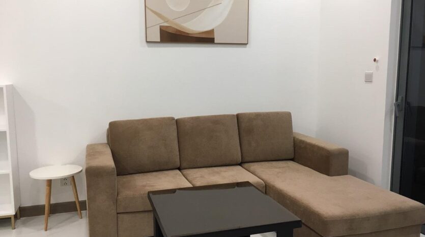 Sunwah Pearl Tháp Whitehouse — Sofa nâu góc + bàn cà phê | Sunwah Pearl Whitehouse Tower — L-shaped brown sofa and coffee table