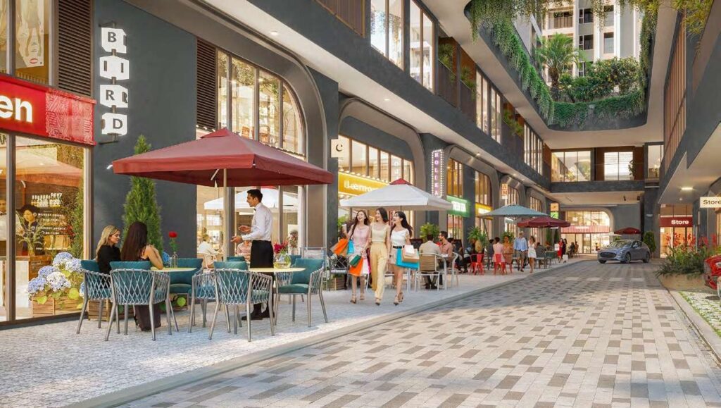 Phố thương mại khối đế Green Skyline với các cửa hàng, quán cà phê và không gian xanh | Green Skyline commercial podium street with retail shops, cafes and greenery