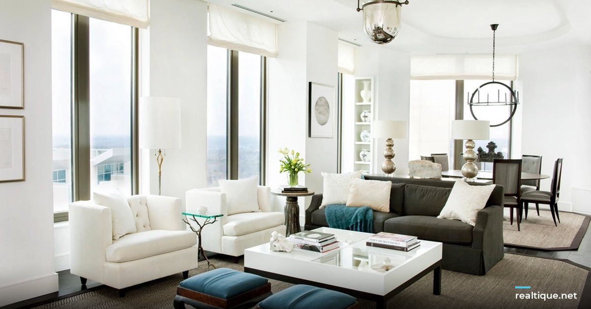Modern apartment living room with large windows