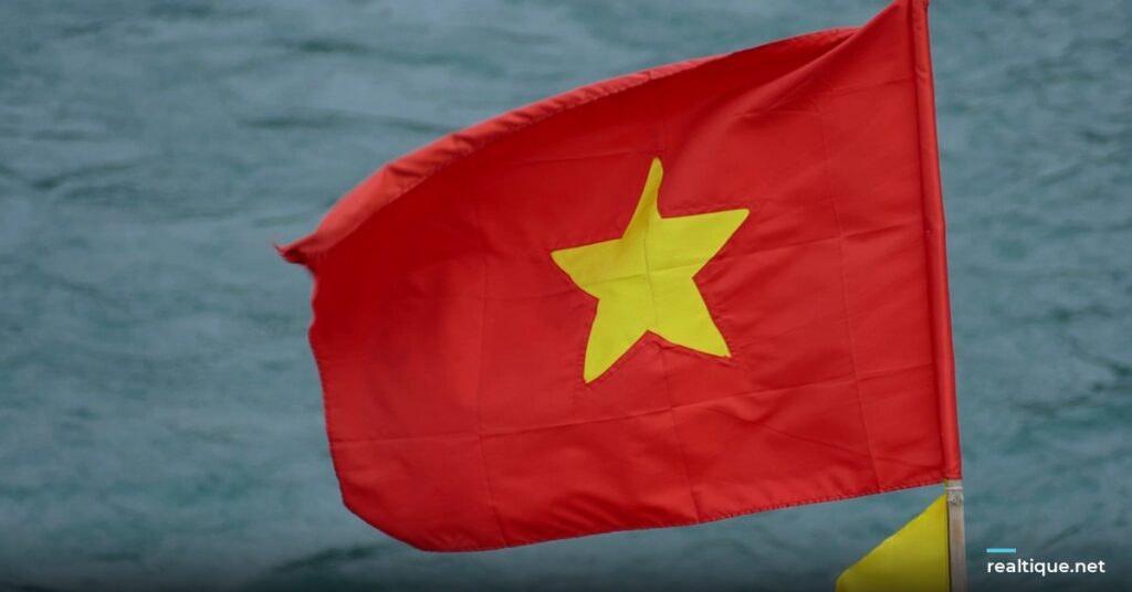 Flag of Vietnam waving over the water | Cờ Việt Nam tung bay trên mặt nước