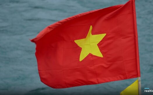 Flag of Vietnam waving over the water | Cờ Việt Nam tung bay trên mặt nước